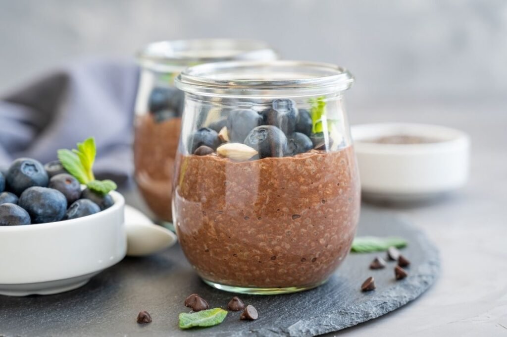 Creamy protein chocolate chia pudding made with yogurt, cocoa, and chia seeds